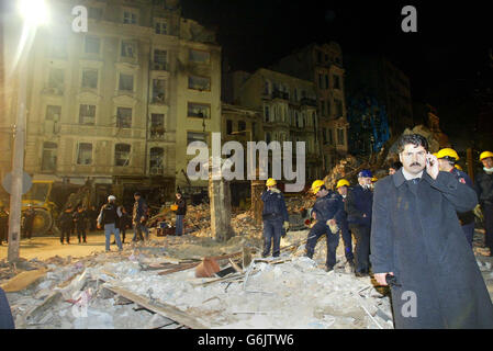 The scene at the British Consulate General's complex in Istanbul, Turkey. Foreign Secretary Jack Straw condemned the terrorists who killed at least three Britons in a blast at the British consulate in Istanbul as 'fanatics filled with hatred'. Mr Straw looked ashen-faced as he picked his way around the rubble. Stock Photo