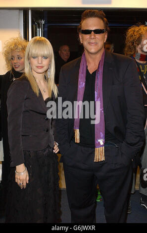 Stars of the film Mena Suvari and Mickey Rourke arrive for the UK premiere of Spun at Odeon Covent Garden in central London. Stock Photo