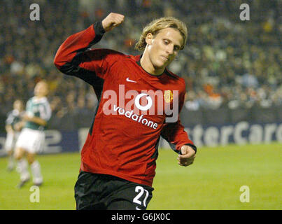 Manchester United's Diego Forlan celebrates his winning goal against Panathinaikos during their Champions League Group E match in Athens. Stock Photo