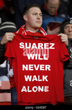 Liverpool fan with a t-shirt supporting player Luis Suarez in stands Stock Photo - Alamy