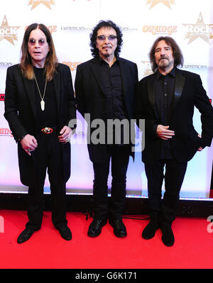 (Left - right) Ozzy Osbourne, Tommy Iommi and Geezer Butler of Black Sabbath attending The Classic Rock Roll of Honour at The Roundhouse, Camden, London. Stock Photo