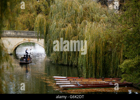 A chauffeured punt makes it's way along the River Cam in Cambridge.
