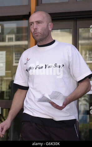 David Chick, 36, leaves Thames Magistrates Court in east London after having been granted bail, on a public nuisance charge. Chick, of Burgess Hill, West Sussex, spent six days on a crane at St Katherine's Way, Tower Bridge, London, to protest about fathers' rights to have access to their children. Stock Photo