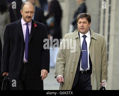 Temporary Chief Superintendent Chris Stevens (left) and Detective Chief Inspector Andy Hebb arrive at the Old Bailey Criminal Court in central London, where the trial of Ian Huntley and Maxine Carr is taking place. Stock Photo