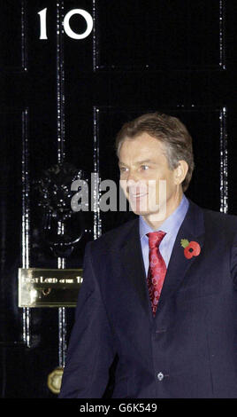 Britain's Prime Minister Tony Blair as he greets Australian Prime Minister John Howard at Downing Street. Mr Howard and Britain's Queen Elizabeth II had earlier attended the Remembrance service in Hyde Park, where the Australian War Memorial was unveiled. Stock Photo