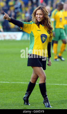 Former Hearsay singer and Norwich fan, Myleene Klass, stages a pitch invasion after her team lose to Watford, during the Nationwide Division One match at Carrow Road, Norwich, NO UNOFFICIAL CLUB WEBSITE USE. Stock Photo