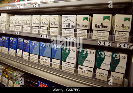 A display of cigarettes in a London shop today. The open display of tobacco  in shops is to be banned in England and Wales, the government has announced  today. But critics say