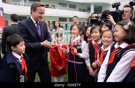 Prime Minister David Cameron meets pupils from Long Jiang Lu Primary School in Chengdu, as part of his three day visit to China. Stock Photo