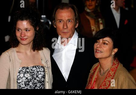 Actor Bill Nighy and his wife Diana Quick (right) arrive for the UK Charity film Premiere of Love Actually, in aid of Comic Relief, held at the Odeon Leicester Square, central London. Stock Photo