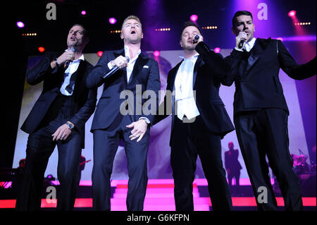 NOTE: EDITORIAL USE ONLY Boyzone (left to right) Keith Duffy, Ronan Keating, Mikey Graham and Shane Lynch of Boyzone perform at the Motorpoint Arena, Cardiff, for the Boyzone 20th anniversary tour. Stock Photo