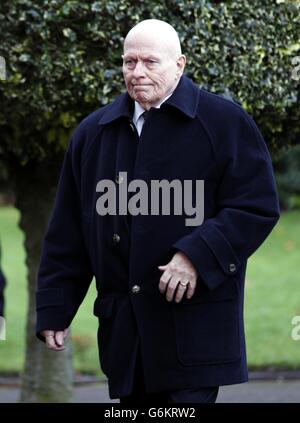 Former Manchester United manager Wilf McGuinness at the funeral of former Manchester United player Bill Foulkes at St Vincent De Paul RC Church, Altrincham, Cheshire. Stock Photo