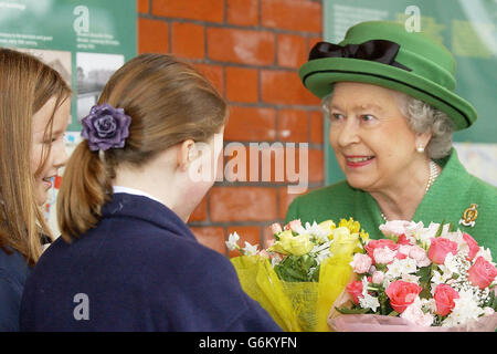 Britain's Queen Elizabeth II meets school children during a visit to Winchester. During her visit to the area the Queen opened the General's Corps Museum that houses the history of regiments such as the Royal Military Police and the Army Pay Corps. Stock Photo