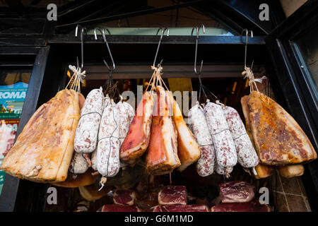 Detail of produce in traditional salumeria , meat and sausage shop,Antica Norcineria Viola on Campo de Fiori, Rome Italy Stock Photo