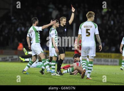 Soccer - Sky Bet Championship - Yeovil Town v Charlton Athletic - Huish Park. Referee Craig Pawson shows a red card to Charlton Athletic's Johnnie Jackson Stock Photo