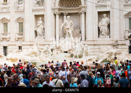 Trevi Fountain or Fontana di Trevia with many tourists in Rome Italy Stock Photo