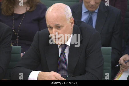 Work and Pensions Secretary Iain Duncan Smith answers questions in front of the Work and Pensions Select Committee at the House of Commons in central London on the annual report and accounts of his department. Stock Photo