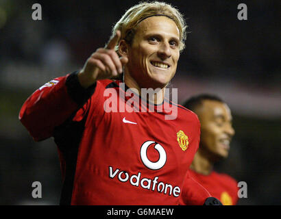 Manchester United's Diego Forlan celebrates scoring the third goal against Aston Villa during the Barclaycard Premiership match at Old Trafford, Manchester. Manchester United won 4-0. Stock Photo