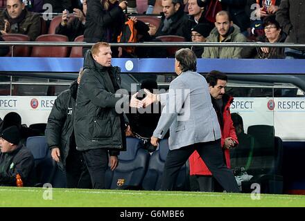 Celtic manager Neil Lennon (left) and Barcelona manager Gerardo Martino (right) shakes hands after the final whistle Stock Photo