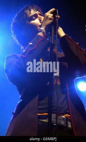 Julian Casablancas lead singer of The Strokes perform on stage at Alexandra Palace in London. Stock Photo