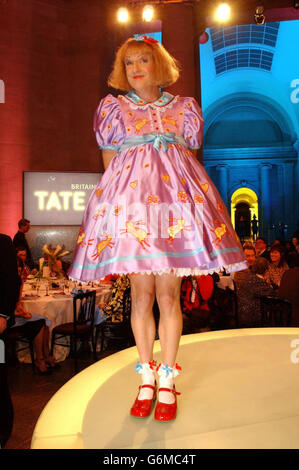 Winner of the Turner Prize, transvestite potter Grayson Perry dressed as his alter ego Claire, during the presentation ceremony at Tate Britain in London. The decision to grant Perry the award marks a rare Turner victory for traditional arts, as the winner puts his own spin on an ancient decorative form. Stock Photo