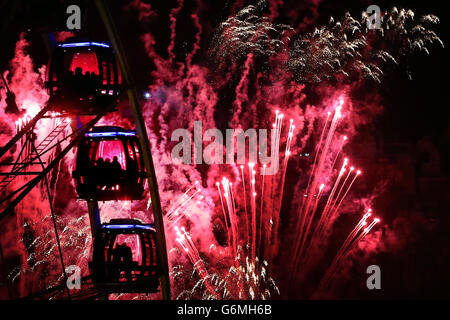Fireworks over Edinburgh to celebrate the New Year's Eve Edinburgh Hogmanay street party, Scotland. Stock Photo