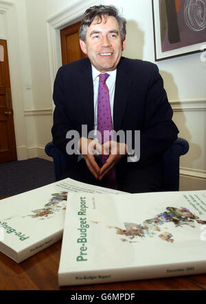 Chancellor of the Exchequer Gordon Brown in his office in the Treasury. Mr Brown, in his Pre-Budget Report, will offer help to local councils to stimulate enterprise, and to families with children, saying employers should take more responsibility for child care. Stock Photo