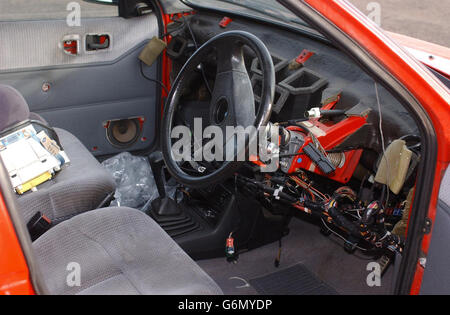 Undated picture released 17/12/03: Forensic experts display the bin and ...