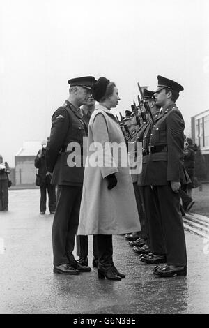 Princess Anne, who expects her second child in May, inspects an honour guard during a visit to the Army Apprentices College in Harrogate. Stock Photo