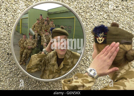 Territorial Army troops - including Private Jolene MacKay (foreground), a store assistant from Wick - from the 51st Highland Regiment, prepare to leave their Perth Headquarters, their families and jobs for a four-month tour of duty in Iraq. Around 80 Highland troops will be based in Basra, where they will guard the Shaibah airfield in the south west of the city. Stock Photo