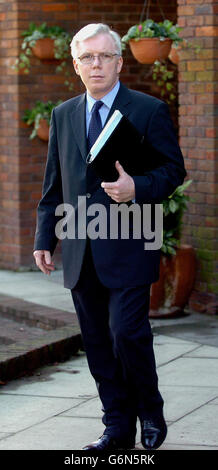 The royal family's coroner, Michael Burgess, poses for photographers at ...