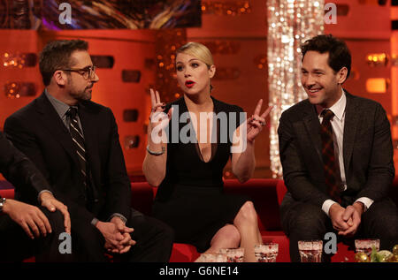 (left to right) Steve Carell, Christina Applegate and Paul Rudd from the film Anchorman 2: The Legend Continues, during the filming of the New Year's Eve Graham Norton Show, at The London Studios, south London, to be aired on BBC One on Tuesday evening. Stock Photo