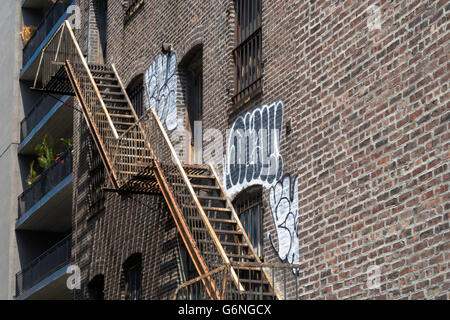 Fire Escape and Graffiti, Chelsea, NYC Stock Photo