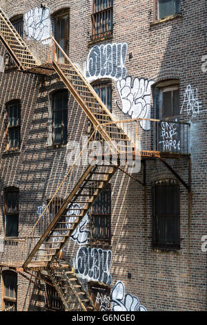 Fire Escape and Graffiti, Chelsea, NYC Stock Photo