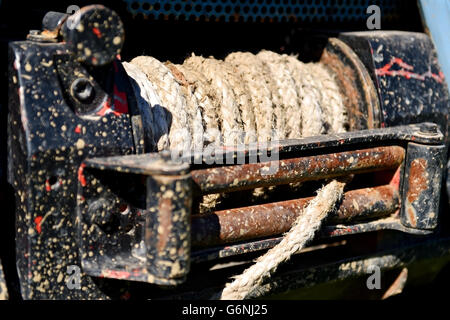 Detail shot with heavy duty rope winch on a off road truck Stock Photo