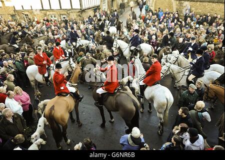 Riders of the Avon Vale hunt take refreshments at the village of Laycock, Wiltshire on the traditional Boxing Day meet as a poll by Ipsos Mori on behalf of the League Against Cruel Sports and the RSPCA found that eight out of ten people believe foxhunting should remain illegal. Stock Photo