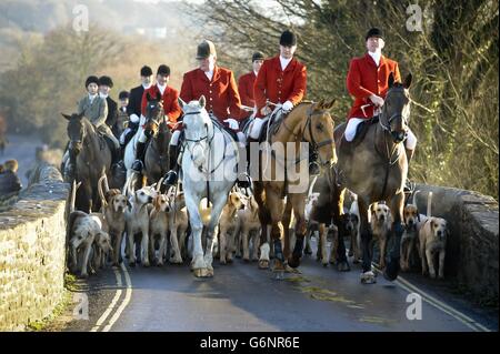 The Avon Vale hunt makes its way to the village of Laycock, Wiltshire on the traditional Boxing Day meet as a poll by Ipsos Mori on behalf of the League Against Cruel Sports and the RSPCA found that eight out of ten people believe foxhunting should remain illegal. Stock Photo