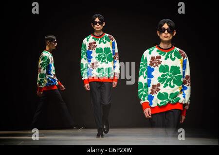 A model on the catwalk during the Casely-Hayford catwalk show, at the Old Sorting Office, in central London, part of London Collections: Men. Stock Photo