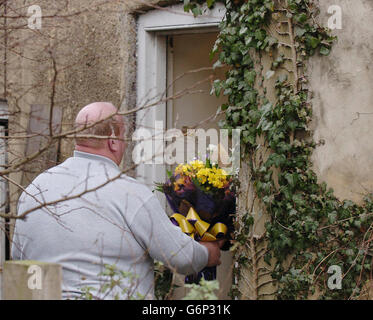 Flowers arrive at the home of Primrose Shipman, the widow of Dr Harold Shipman, in Walshford, North Yorkshire, on the day that the prison ombudsman began his independent inquiry into the death of Dr Shipman at Wakefield Prison. Britain's most prolific serial killer was discovered hanged in his cell yesterday morning with a ligature made from bed sheets. Stock Photo