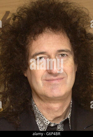 Queen guitarist Brian May, who officially opened the new House of Guitars store, in Brune Street, central London. May holds a custom built Burns Brian May Honey Sunburst guitar. Stock Photo
