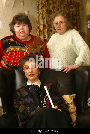 Miss Iris Rosenfield (severely disabled) (left) her mother Mrs Matilda Rosenfield, and seated, Mrs Sharon Simon (requires white stick), pictured today, Friday at their Fleetwood home. Two disabled sisters and their elderly mother were thrown off a coach by a driver because of their handicaps, a charity for the blind said today. Wheelchair-user Iris Simon, 55, of Fleetwood, Lancashire, and her sister Sharon, 46, who is blind, received the 'humiliating treatment' after booking a five-day coach trip through National Holidays to Cliftonville, Norfolk. Stock Photo