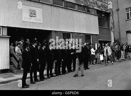 A miner addresses a line of policemen outside Ramsgate Magistrates Court, where Kent miners' President Malcolm Pitt was remanded in custodyfor nine days, accused of two breeches of bail conditions in connection with picketing during the miners dispute. Stock Photo