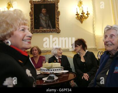 British actress Helena Bonham Carter (second right) speaks with guests during a reception at 10 Downing Street in central London, for survivors of the Holocaust and other genocides to commemorate Holocaust Memorial Day. Stock Photo