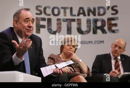 First Minister Alex Salmond (left) with Deputy First Minister Nicola Sturgeon (centre) and Cabinet Secretary for Finance John Swinney (right) during a question-and-answer session on Scotland's future at the Regal Community Theatre in Bathgate, Scotland. Stock Photo