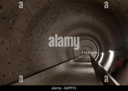 Round concrete elements of a built subway tunnel under construction. This tunnel is part of the north-south line under construct Stock Photo