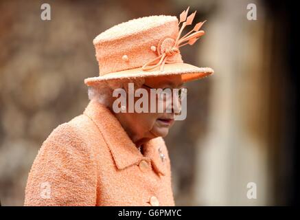 Queen Elizabeth II attends the church of St Peter, Wolferton, on the royal Sandringham estate in Norfolk. Stock Photo