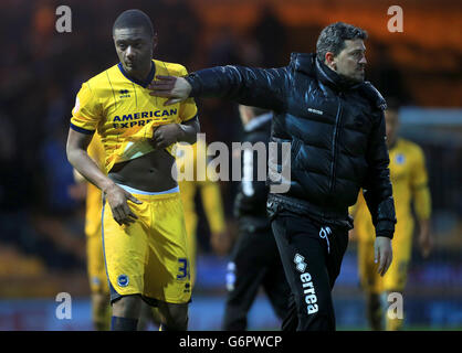 Soccer - FA Cup - Fourth Round - Port Vale v Brighton & Hove Albion - Vale Park. Brighton & Hove Albion Manager Oscar Garcia thanks one of his goalscorer's Rohan Ince after 3.1 win at Port Vale in the FA Cup 4th round Stock Photo