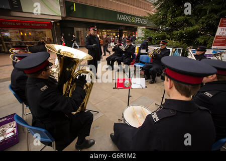 UK, Gloucestershire, Gloucester, Eastgate Street, Salvation Army band playing outside at Christmas Stock Photo