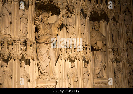 UK, Gloucestershire, Gloucester, Cathedral, carved stone saints decorating side chapel altar piece Stock Photo