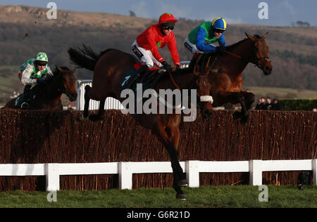 Sew On Target ridden by Brendan Powell in the Stewart Family Thank You Gold Cup during day two of the 2013 The International at Cheltenham Racecourse, Cheltenham. Stock Photo