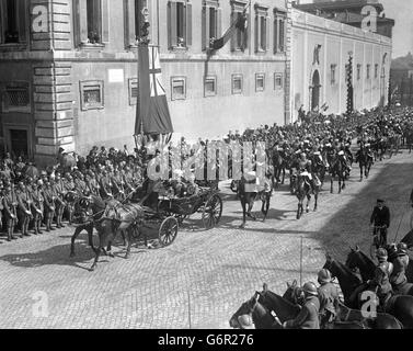 King George and Victor Emmanuel III, King of Italy, driving through the streets of Rome. Stock Photo